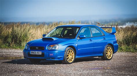 2005 wrx. The 2005 Subaru Impreza WRX is a compact car that offers a blend of performance and practicality. It features a turbocharged engine, all-wheel drive system, and a sport-tuned suspension, making it a popular choice for those seeking a thrilling driving experience. 