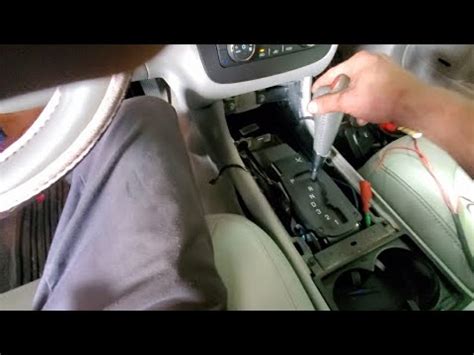 2006 buick lucerne shift lock solenoid replacement.  Watching this vide...