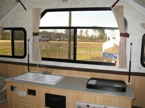 Floorplan. 2016 XL 1935 Features and Options. Enjoy the comfort of camping in this A-Frame folding pop-up camper by Chalet. It is easy to get ready, set up, and camp with the XL 1935! Straight in from the door you will find the kitchen area with a three burner range, refrigerator below the counter, and a double kitchen sink. To the left of the .... 