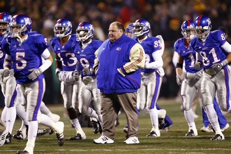 Mark Thomas Mangino (born August 26, 1956) is a former American football coach. He served as the head football coach at the University of Kansas from 2002 to 2009. In 2007, Mangino received several national coach of the year honors after leading the Jayhawks to their only 12-win season in school history and an Orange Bowl victory. However, he …. 