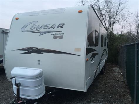MSRP. $29,989. Type. Travel Trailer. Rating. #5 of 125 Keystone Travel Trailer RV's. 2 reviews. Compare with the 2009 Keystone Springdale 266RL-SSR.