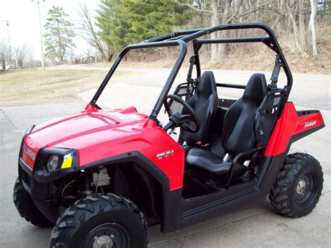 The '08 RZR is an 800cc mid-engine, twin rider, "dune-buggy" style ATV that's designed to eat up those bumps with four-wheel independent suspension and a low-slung chassis that seats the.... 