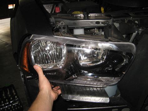 2011 dodge charger headlight removal