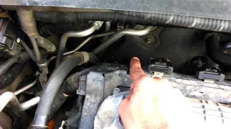 The garage reported that the malfunction code was "Misfire Cylinder #3". Cylinder #3 and spark plug were removed and cleaned due to deposits from oil entering the engine. - Mason, OH, USA. 