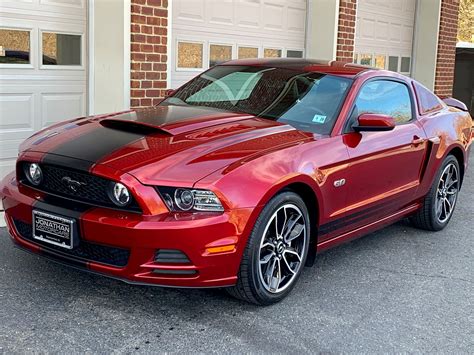 All specifications, performance and fuel economy data of Ford Mustang GT/CS (313 kW / 426 PS / 420 hp), edition of the year 2014 until July 2014 for North America , including acceleration times 0-60 mph, 0-100 mph, 0-100 km/h, 0-200 km/h, quarter mile time, top speed, mileage and fuel economy, power-to-weight ratio, dimensions, drag coefficient, etc.. 