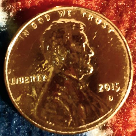 2014 D Lincoln Penny, very small. I've taken to coin shop, they sent me to get x-rayed, 79% zinc, 21% copper, weighs 2.2 g. Took it to jewelers, baffled, but believe it to be fake, but offered to send for grading. Attaching pics, front and back. Coins around it are for reference. It's the 1 in the middle. Report this Post to the Staff. Snobro110.. 