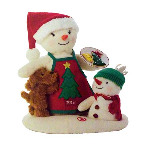 2015 Joyful Snowman - Ornament Little snowman is wearing a purple top hat . The snowman is holding a string of garland that spells out JOY. This was a Hallmark associate gift ornament for employees. LPR3359 Mint in Box Not Dated Size: 3 inches H. Artist: Joanne Eschrich and Robert Chad. 