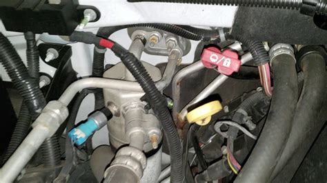 2018 gmc acadia low pressure port location. 3 posts · Joined 2018. #1 · Apr 10, 2019. I'm looking for confirmation of WHERE the low side AC port is on the 2015. The one at the top - that i CAN reach - is high side. What I THINK is the low side seems to be in an UNREACHABLE SPOT on the underside behind the radiator, that's dang near impossible to get your hand in between … 