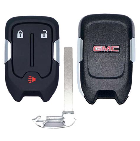 How to change a dead coin cell battery in the key fob remote control for the keyless entry system of a first generation 2007 to 2016 GMC Acadia SUV with photo illustrated steps and the replacement part number.. 