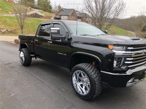 5th gen ram 2500 with stock wheels and 35x12.50r20. 