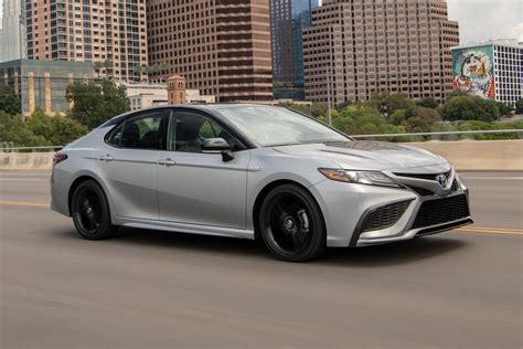 2022 toyota camry hybrid. The Camry XSE starts at $30,595 with the four-cylinder engine and $35,720 with the V6. The XSE has a sport-tuned suspension and shares its sportier front and rear fascia with the SE and TRD trims. Otherwise, the XSE has the same standard and available features as the XLE. Toyota Camry TRD. 