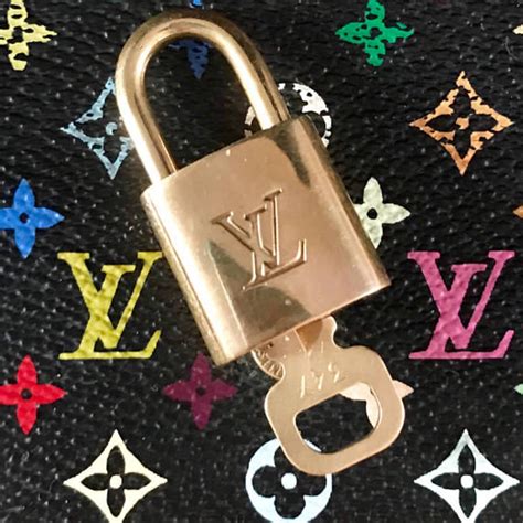 Authentication help? Louis Vuitton padlock : r/Louisvuitton