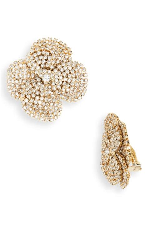 I will own a pair of these one day. Chanel CC Gold Stud Earrings <3   Yellow gold earrings studs, Glitter stud earrings, Gold earrings studs
