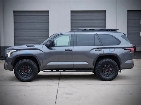 1. Suspension Lift Kit for 2023 SEMA Sequoia. First up is a suspension lift kit. This will not only give your SUV a more aggressive look, but it will also improve its off-road performance. It will also give you the ability to add larger wheels and tires. 2. Custom wheels or a tire rack for your 2023 Sequoia.. 