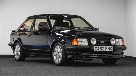 1985 escort gt  First car was a Mitsu based Plymouth Champ, that Car and Driver loved, but it fell apart after 50k