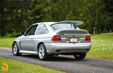 1995 ford escort cosworth rs silver  Escort RS Cosworth came into production in 1992 as Ford's most flagship rally challenger and a supercar for private buyers