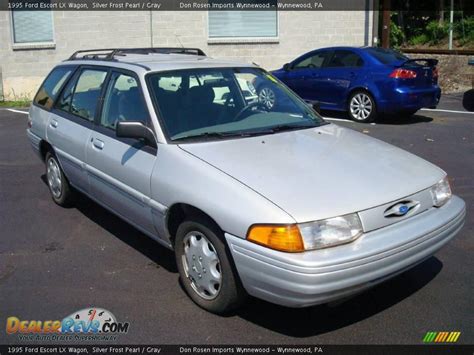 1995 ford escort silver  1995 1996 Ford Escort wheel cover, OEM # F4CZ1130A, F5CZ1130A, Hollander #