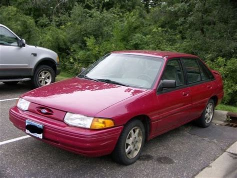 1996 teal ford escort 4 door hatchback  or Best Offer