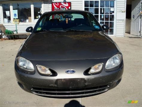 2001 ford escort 4 door charcoal gray  But yet nothing has changed