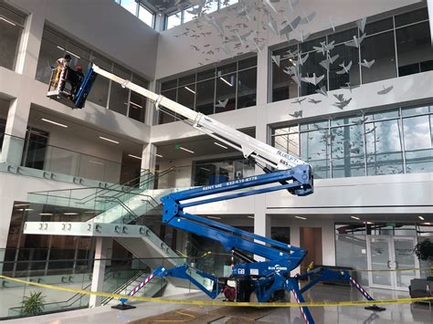 50 ft atrium man lift  Outriggers: Yes