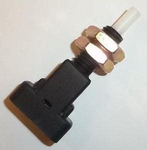97 ford escort brake light switch  it is on the brake pedal support