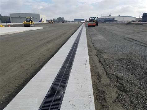 Airport trench drains  Neenah R-4990 Airport Trench Grates; Neenah R-4996 Self Forming Trench Pan; Neenah R-4028 To R-4055 Sewer Pipe Grate; Neenah R-4215 to 4360 Beehive Grates;Airport Trench Drain