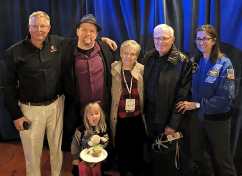 Alden tombaugh  EDT Alden Tombaugh (center and Annette Tombaugh, the children of Pluto's discoverer, pose with a newly released photo of the dwarf planet with the daughter of