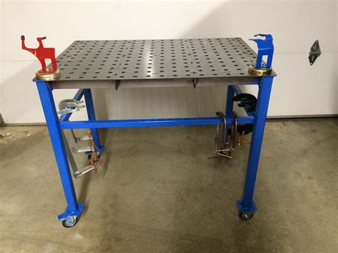 Arc flat welding table  Now, attach steel frame to top of legs
