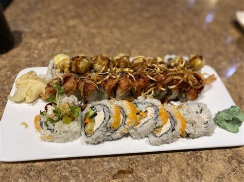 Ari sushi puyallup 95 – Cali topped with Assorted fish