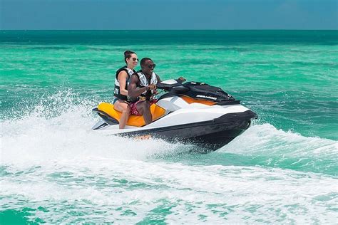 Aruba jet skiing  For a fun day out, book this group tour that allows you to do several activities like river rafting, jet skis, limestone massages, and much more