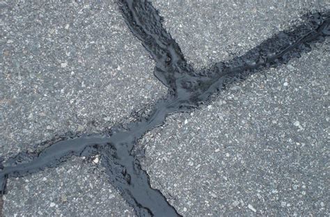 Asphalt crack repairs contractor in atlanta ga During the drying process, the filler may soak into the crack and need a second coat