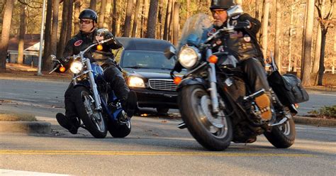 Atlanta police funeral motorcycle escort Phillips, a 10-year veteran of the police force, died after the motorcycle he was riding struck a vehicle that made a sudden U-turn out of the procession that Phillips was escorting