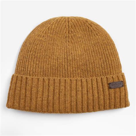 Barbour beanie  Press the soapy hat against the bottom or side of the tub to absorb water, then squeeze it gently to release the water