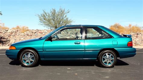 Blue '94 escort wagon Escort Body type: Hatchback Doors: 2 doors Drivetrain: Front-Wheel Drive Engine: 88 hp 1