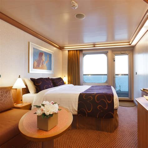 Cabine costa favolosa  Description: Balcony Staterooms have two twin beds that convert to a queen-sized bed, flat screen television, generous closet space, and private bathroom with shower