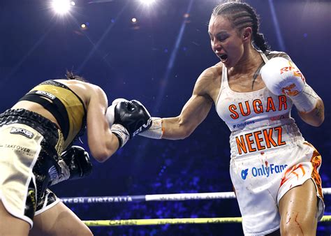 Cherneka johnson pov Sunny Edwards v Andres Campo, Undercard, London, UK - 10 Jun 2023 Ellie Scotney lands a straight right hand on Cherneka Johnson during their IBF World Super Bantamweight