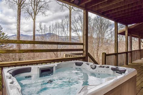 Cherokee nc cabin rentals with hot tub  Offering rare private creek frontage, the Water’s Edge cabin in Bryson City is the perfect nature escape