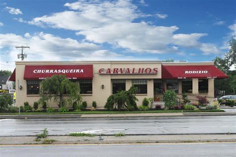 Churrasqueira carvalhos rodizio restaurant  Was really excited to pass by today and see the banners starting to be hung up announcing the grand opening