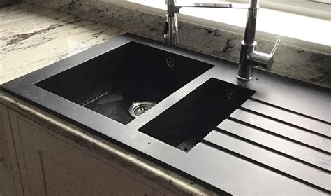 Corian sink accessories  Because Corian® Solid Surface is nonporous, stains do not penetrate the surface