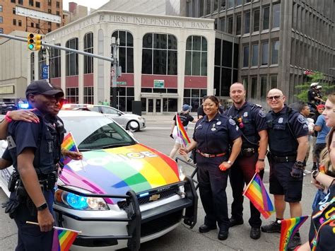 Detroit pride nazis police escort  In Detroit, a very old threat to the Pride movement reared its head today as the rainbow flag fell under the shadow of a Swastika