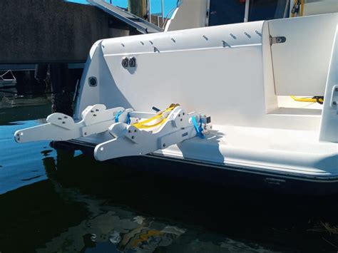 Dinghy davit system  At the same time, almost any system can hold the dinghy well back from the backstay when the dinghy is raised