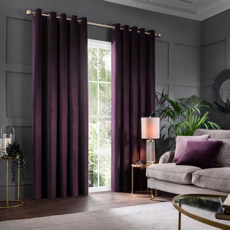 Dunelm aubergine curtains Includes 2 x Curtain Panels; Solar matte face fabric; Blackout coating which keeps out external light; Thermal properties to help regulate room temperature; Fully lined; Eyelet header; Available in a choice of colours and sizes; Our Solar Blackout Eyelet Curtains are the perfect addition to any home