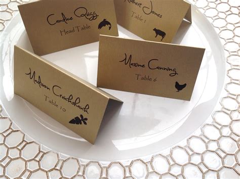 Escort cards on food table set up wedding 