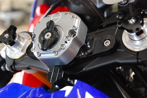 Escort sportbike stem mount fit with steering damper  No matter how aggressive the front end, no matter how much power your sporty bike has, it doesn't need damping just to ride normally