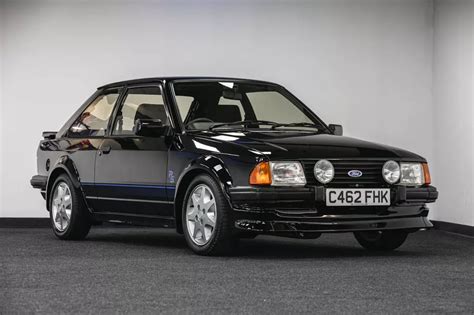 Escort turbo rs for sale  A true hot hatch from the 80s, this Escort RS Turbo is finished in Black and, as it was originally a Ford Dealer demonstrator, this 1988 model was fitted with the 1990 updated interior