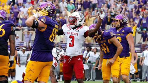 Fan escorted out of ecu game <b>muidats eht morf detrocse dna deifitnedi saw naf ehT“ </b>