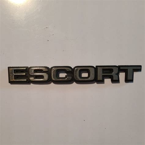 Ford escort emblem  Categories;1983 Ford Escort Parts - Exterior Emblems