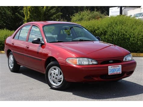 Ford escort hatchback 1998 model  I obtained my Escort from it's grave