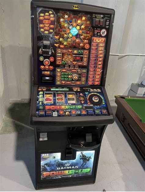 Fruit machine jackpot  Shows three wheels with a lever to the side