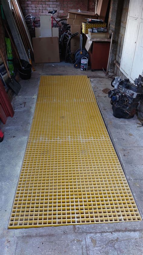 Garage pit safety covers  They prevent anyone from falling into the vehicle inspection pit in a transport workshop, whilst allowing full access to the vehicle underside